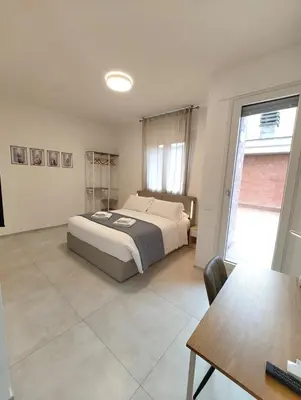 Letto o letti in una camera di Baracca Space Apartments