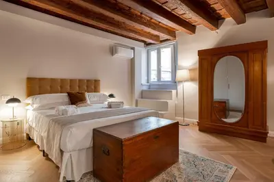 Letto o letti in una camera di NEW Luxury 3-bedroom & 4-bathroom Duomo