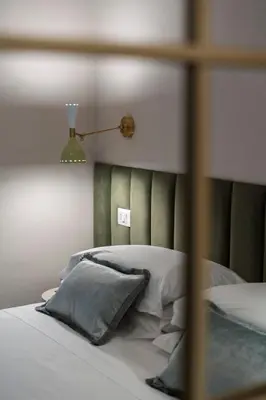Letto o letti in una camera di NEW Luxury 3-bedroom & 4-bathroom Duomo