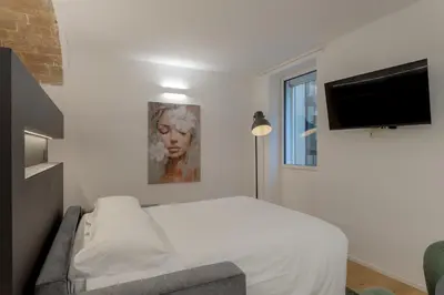 Letto o letti in una camera di Florence Santa Maria Apartment