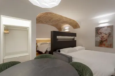 Letto o letti in una camera di Florence Santa Maria Apartment