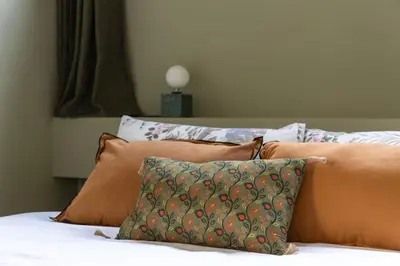 Letto o letti in una camera di Augustus Suite Vw Duomo Apt w 3 bad 3 bat Ac