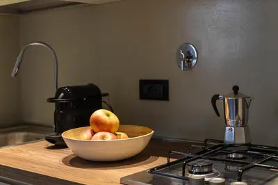 Cucina o angolo cottura di Augustus Suite Vw Duomo Apt w 3 bad 3 bat Ac