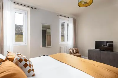 Letto o letti in una camera di Augustus Suite Vw Duomo Apt w 3 bad 3 bat Ac