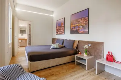 Area soggiorno di Liberty Lucia Apartment Florence