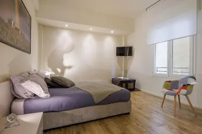 Letto o letti in una camera di Liberty Lucia Apartment Florence