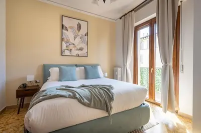 Letto o letti in una camera di Orsini Apartment with balcony and free parking
