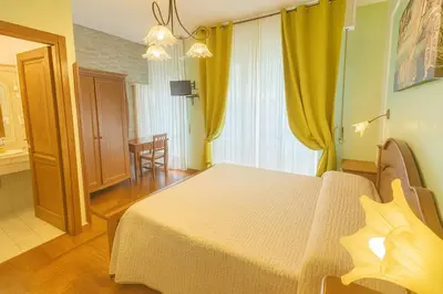 Letto o letti in una camera di Notturno Fiorentino Rooms