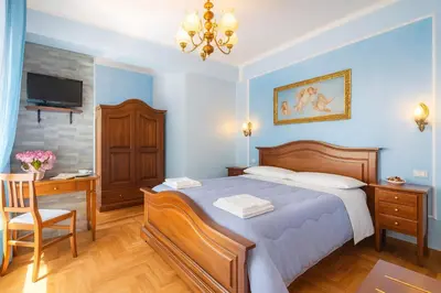 Letto o letti in una camera di Notturno Fiorentino Rooms