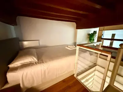 Letto o letti in una camera di Buena Onda Florence