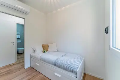 Letto o letti in una camera di UNYCA - Florence Oltrarno Apartment
