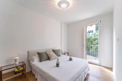 Letto o letti in una camera di UNYCA - Florence Oltrarno Apartment
