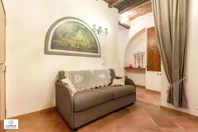 Area soggiorno di Florentine Apt Pontevecchio by Florence Sweet Homes