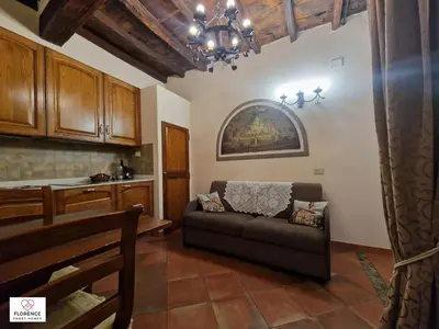 Area soggiorno di Florentine Apt Pontevecchio by Florence Sweet Homes