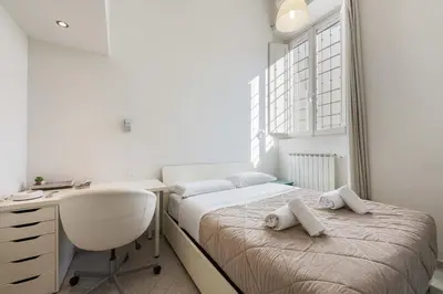 Letto o letti in una camera di Casa Serena