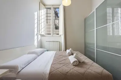 Letto o letti in una camera di Casa Serena