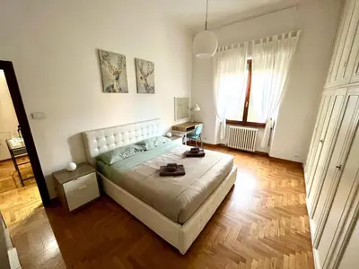 Letto o letti in una camera di Florence Lungarno Apartment