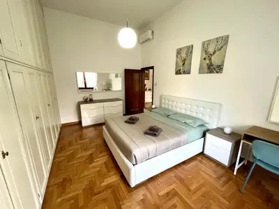 Letto o letti in una camera di Florence Lungarno Apartment