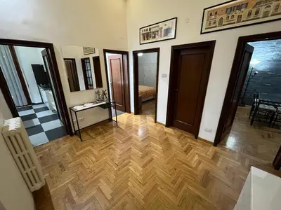 Letto o letti in una camera di Florence Lungarno Apartment