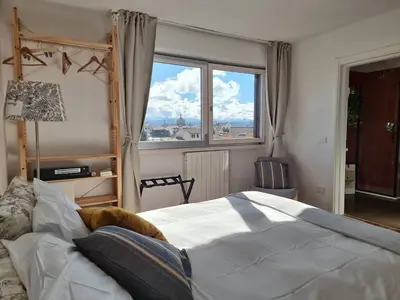 Letto o letti in una camera di L'Atelier dei Viaggiatori Luminoso ultimo piano