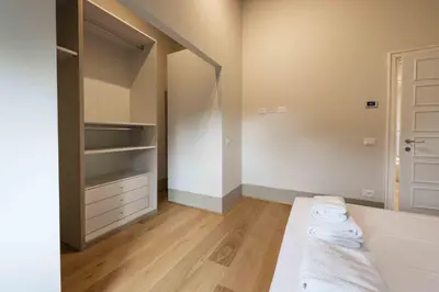 Letto o letti in una camera di La casa agli Orti Oricellari by MMega