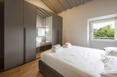 Letto o letti in una camera di La casa agli Orti Oricellari by MMega
