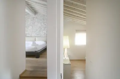 Letto o letti in una camera di Dimora Adimari