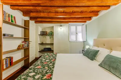 Letto o letti in una camera di Soggiorno autentico vicino a Santa Croce
