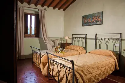 Letto o letti in una camera di Florence Winery Country Apartments - Fattoria Lavacchio