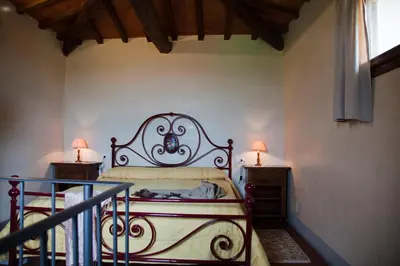 Letto o letti in una camera di Florence Winery Country Apartments - Fattoria Lavacchio