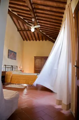 Letto o letti in una camera di Florence Winery Country Apartments - Fattoria Lavacchio