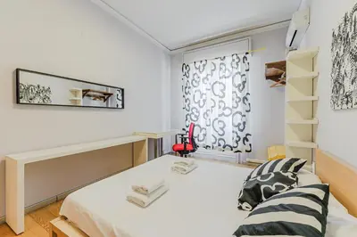 Letto o letti in una camera di Stile e spazio a due passi dal centro