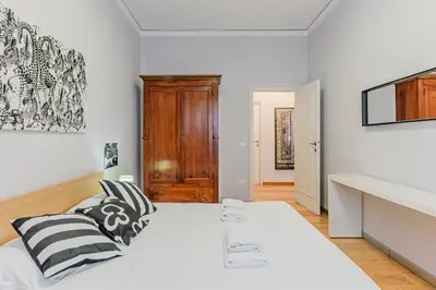 Letto o letti in una camera di Stile e spazio a due passi dal centro