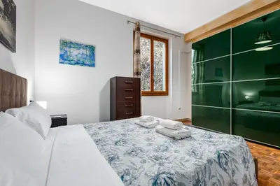 Letto o letti in una camera di Firenze Loft