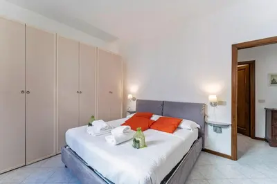 Letto o letti in una camera di UNYCA - Uffizi Museum Apartment in Florence