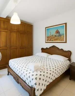Letto o letti in una camera di Florence Alfani Apartment
