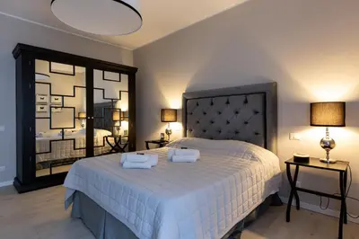 Letto o letti in una camera di Black & Wild - Eleganza e relax vicino Firenze