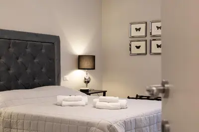 Letto o letti in una camera di Black & Wild - Eleganza e relax vicino Firenze