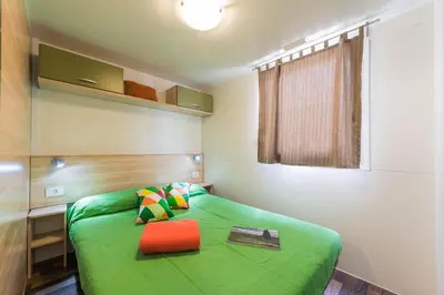 Letto o letti in una camera di Camping Village Il Poggetto - Maeva