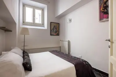 Letto o letti in una camera di Calimaruzza Apartment - by Maison Florence