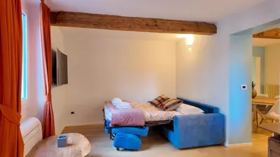 Area soggiorno di Pellicceria Charm Apartment