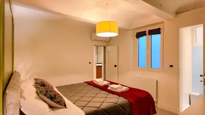 Letto o letti in una camera di Pellicceria Charm Apartment