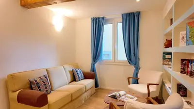 Area soggiorno di Pellicceria Charm Apartment