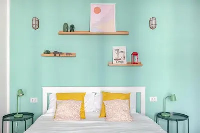 Letto o letti in una camera di New Happiness Studio Tram 150m