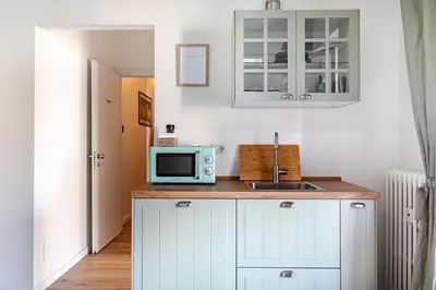 Cucina o angolo cottura di New Happiness Studio Tram 150m