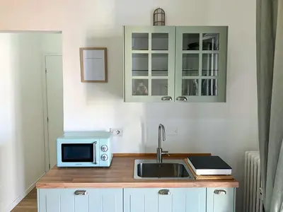 Cucina o angolo cottura di New Happiness Studio Tram 150m
