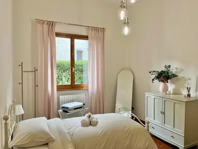 Letto o letti in una camera di La corte di Rolando - Delizioso appartamento a Fiesole