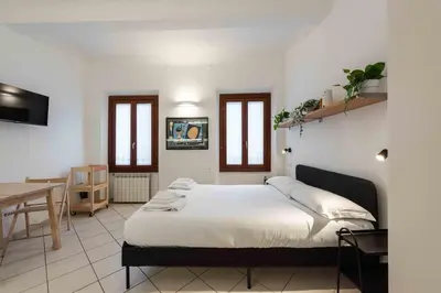 Letto o letti in una camera di Ariento Apartments By MMega