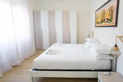 Letto o letti in una camera di Bright Apartment 2 in Guido monaco