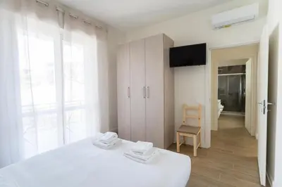 Letto o letti in una camera di Bright Apartment 2 in Guido monaco